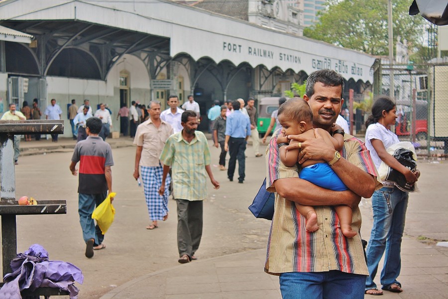 People outside Fort train station. Colombo. Sri Lanka.