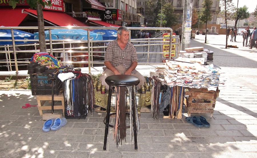 Bored shoemaker in Istanbul. Turkey.