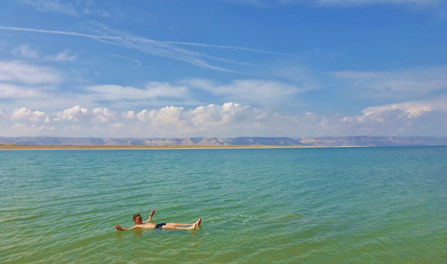 I floated like a rubber duck on the Dead Sea in Jordan. Occupied Palestine on the other side of the shore.